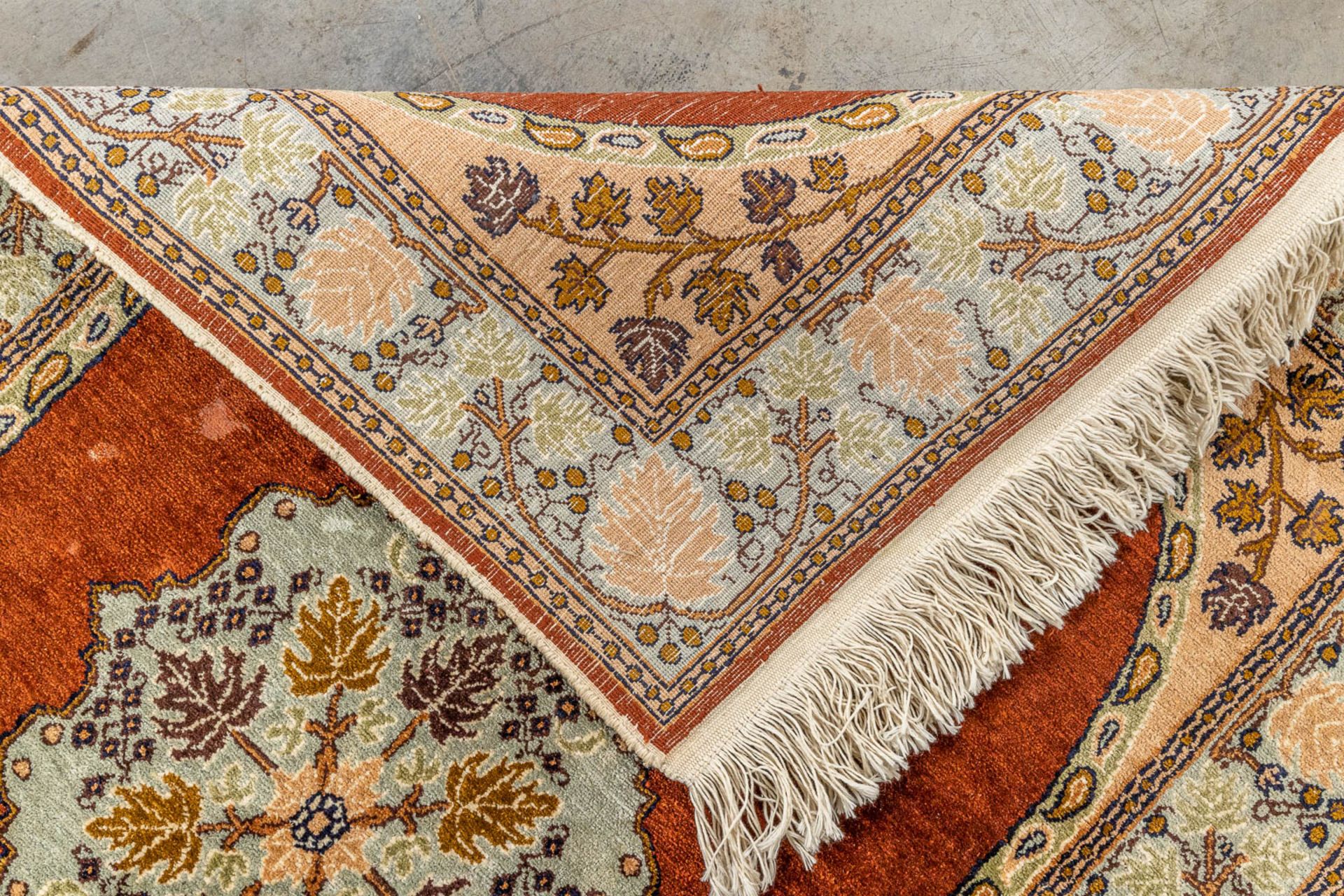 An oriental hand-made carpet. (79 x 125 cm) - Image 6 of 6
