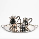 A coffee and tea service made of silver-plated metal and marked Christofle.