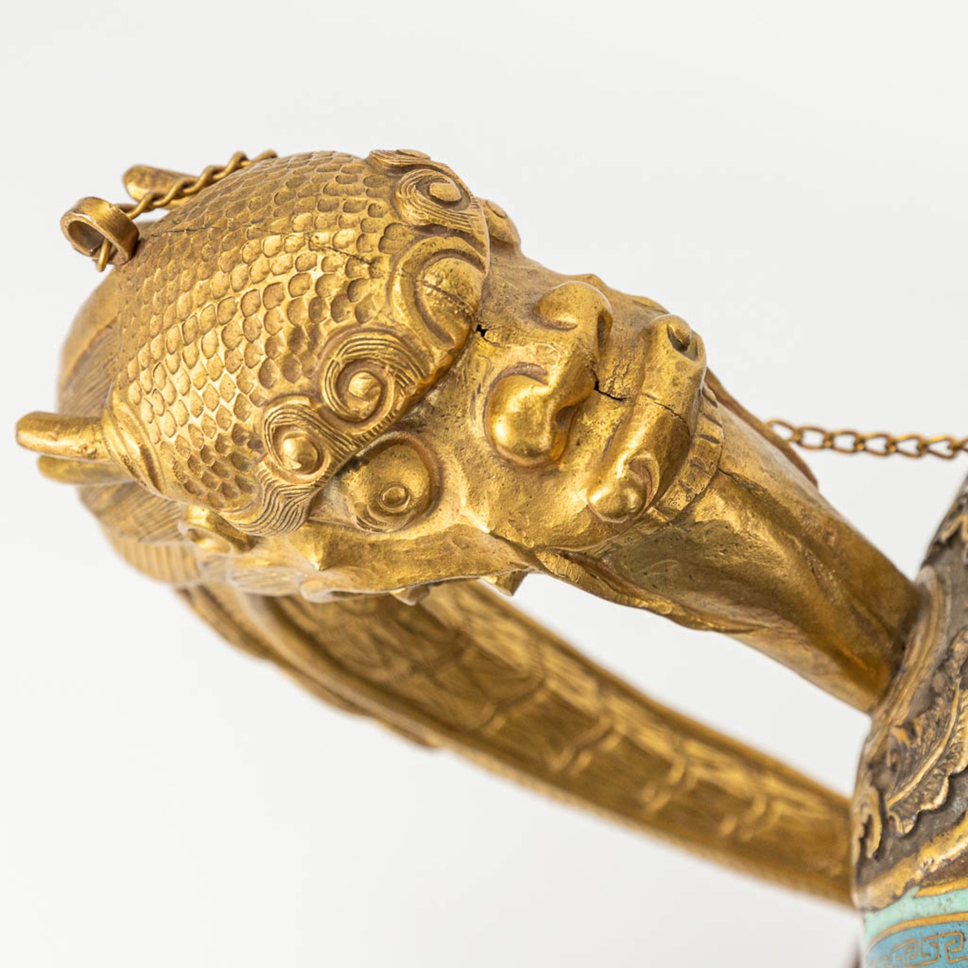 A Tibetan ceremonial ewer made of gilt bronze and finished with cloisonnŽ bronze. - Image 4 of 18