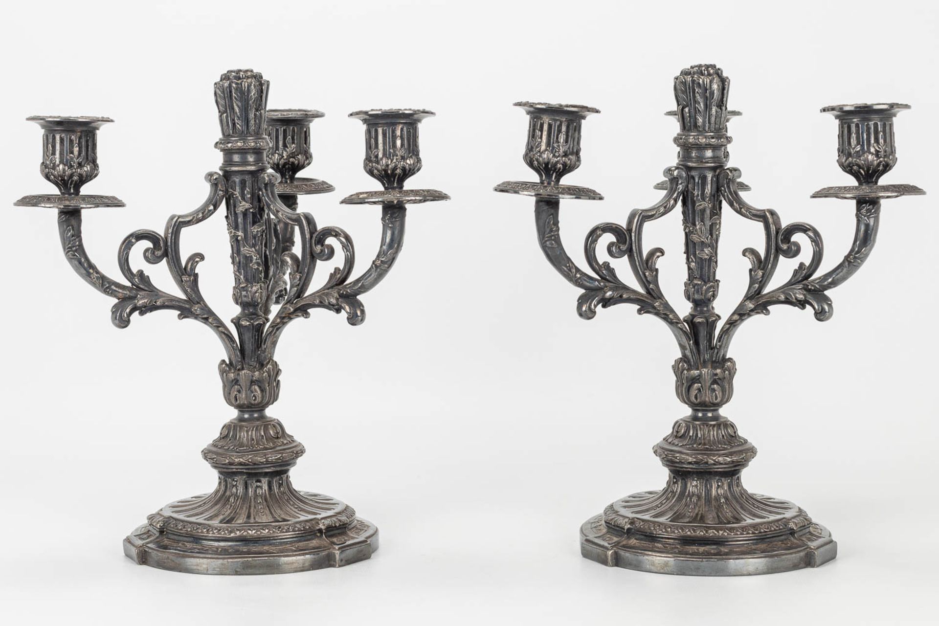 A pair of silver-plated Louis XVI-style candlesticks. - Image 4 of 9
