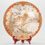 A large Japanese Kutani plate with decor of birds and flowers. 19th/20th century.