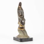 A statue made of spelter in art deco, mounted on a marble base.