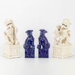 A collection of 2 pairs of Foo dogs, made of Chinese porcelain with white and blue glaze.
