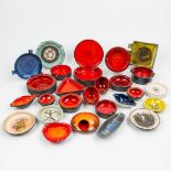 A large collection of 27 ashtrays made by Perignem and Amphora and marked.
