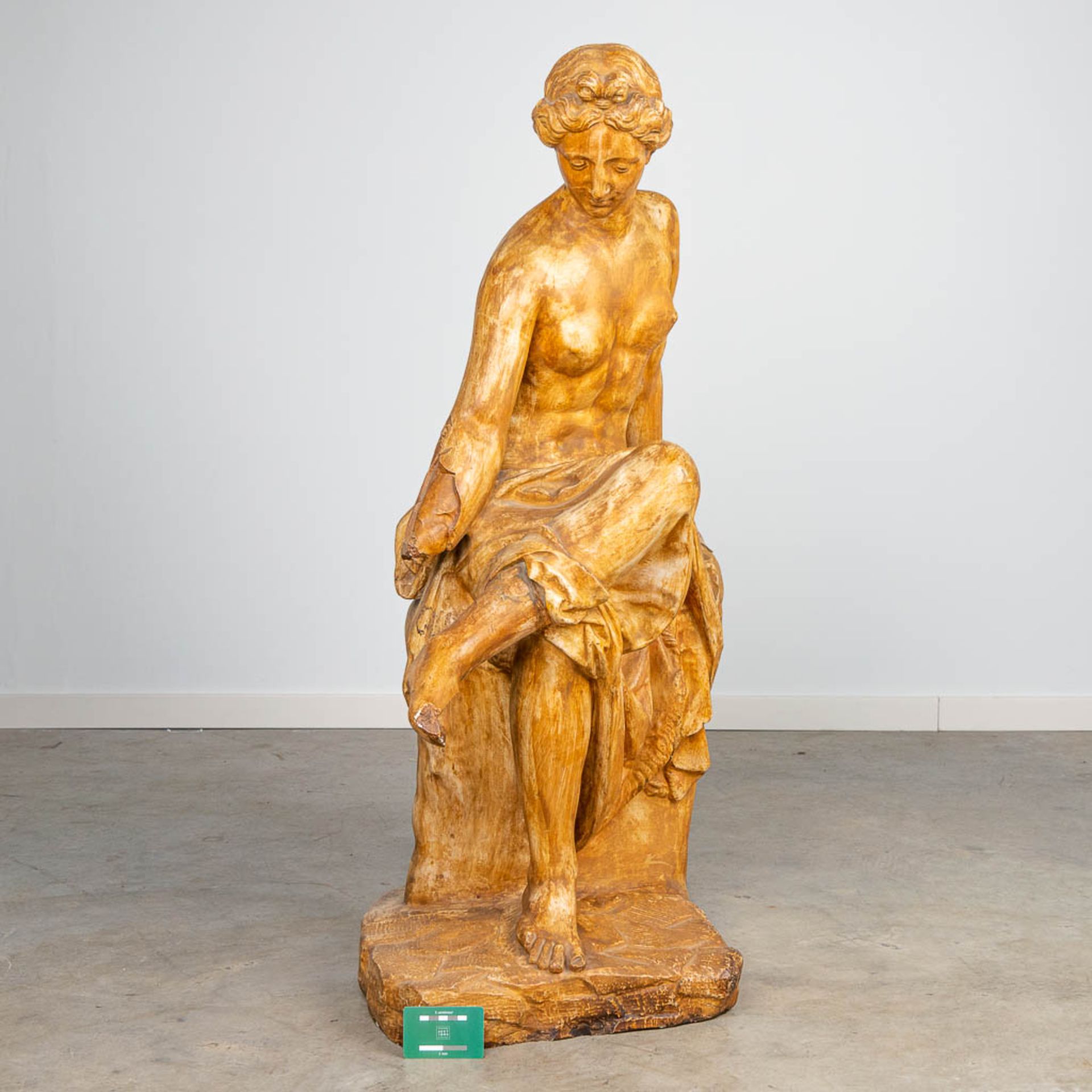 a large decorative statue of a seated lady, made of patinated plaster. - Image 2 of 10