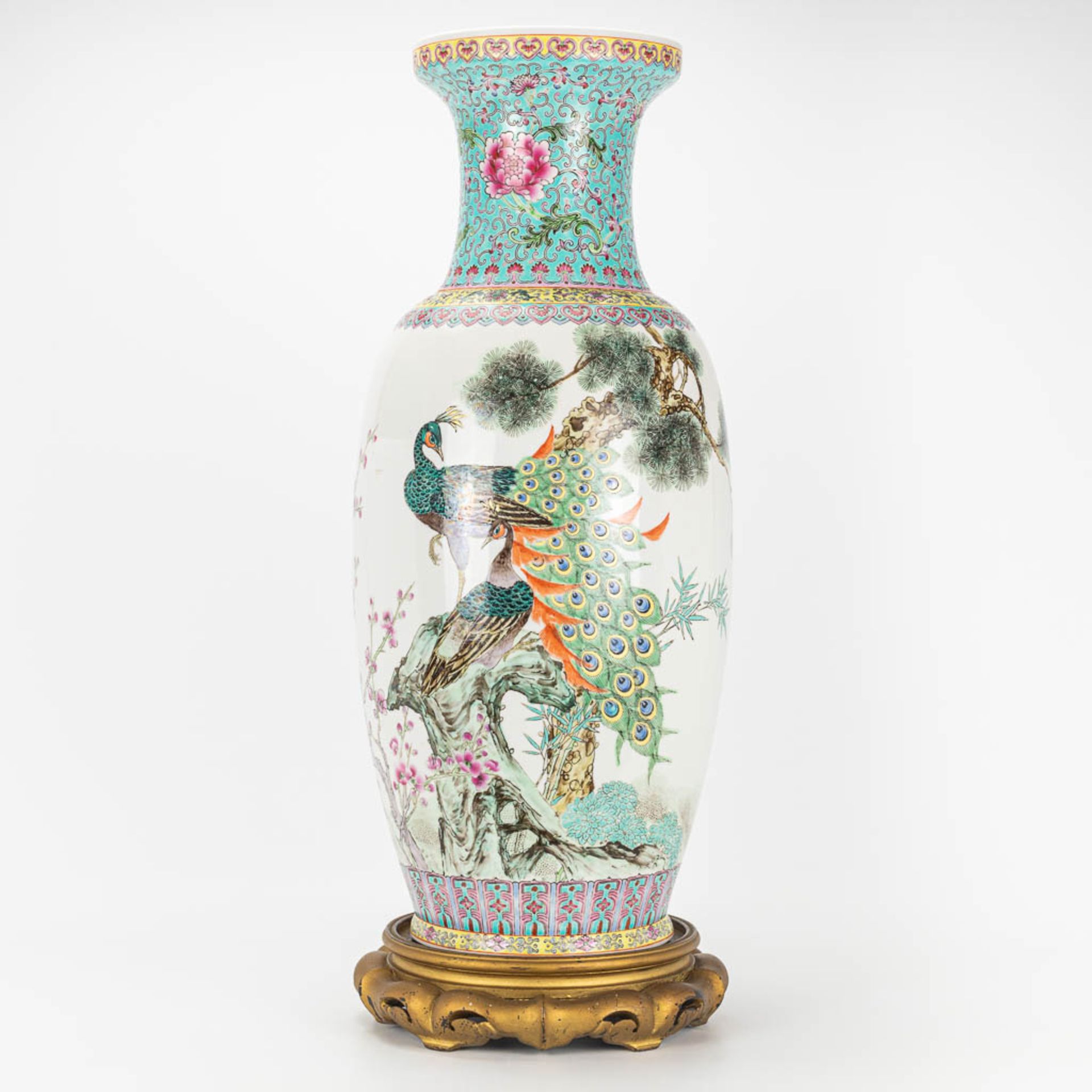 A vase made of Chinese porcelain and decorated with peacocks