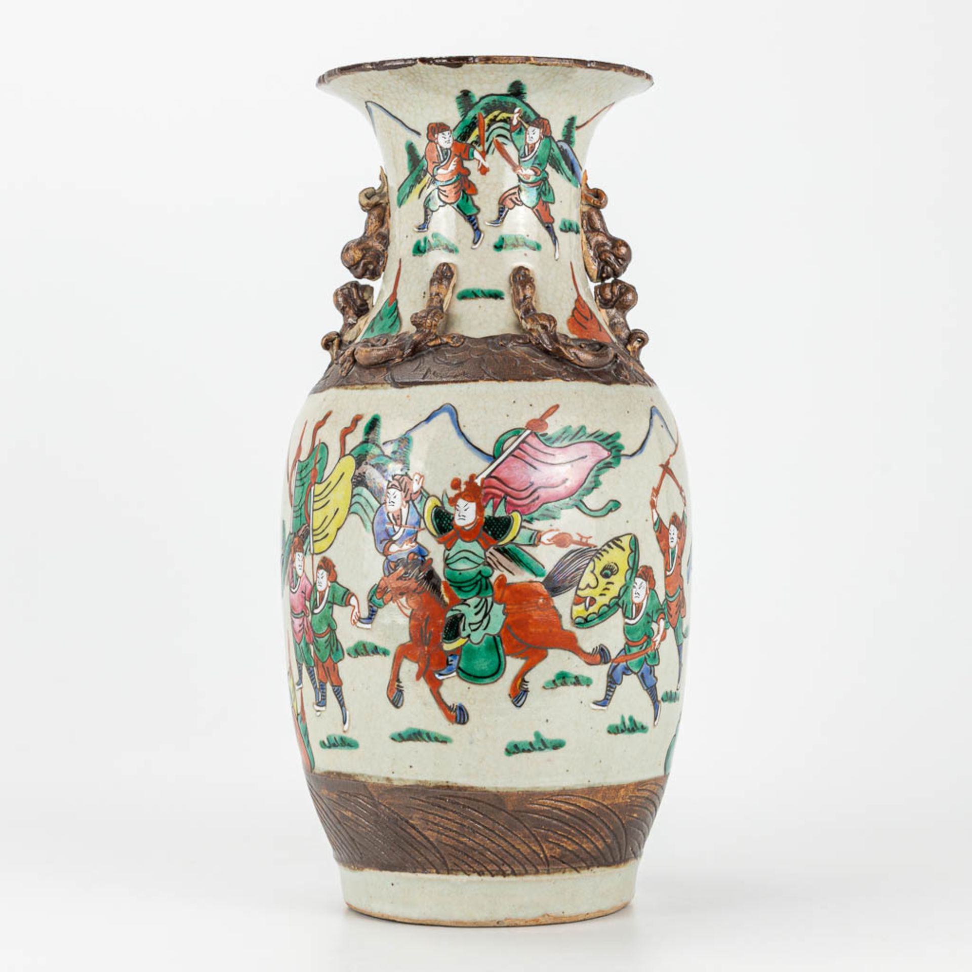 A Nanking vase made of Chinese porcleain and decorated with warriors