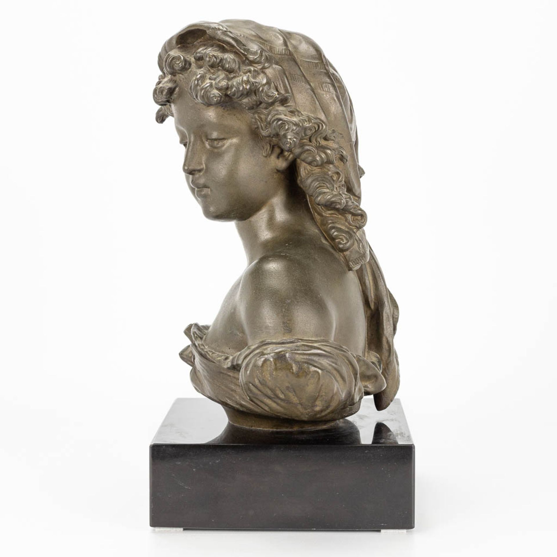 A bust of a young lady, made of bronze and marked Compagnie des bronzes, Bruxelles. - Image 2 of 11