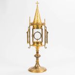 A monstrance, made of brass and glass in neogothic style