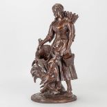 A wood sculpture of a lady with rooster, Black Forest.