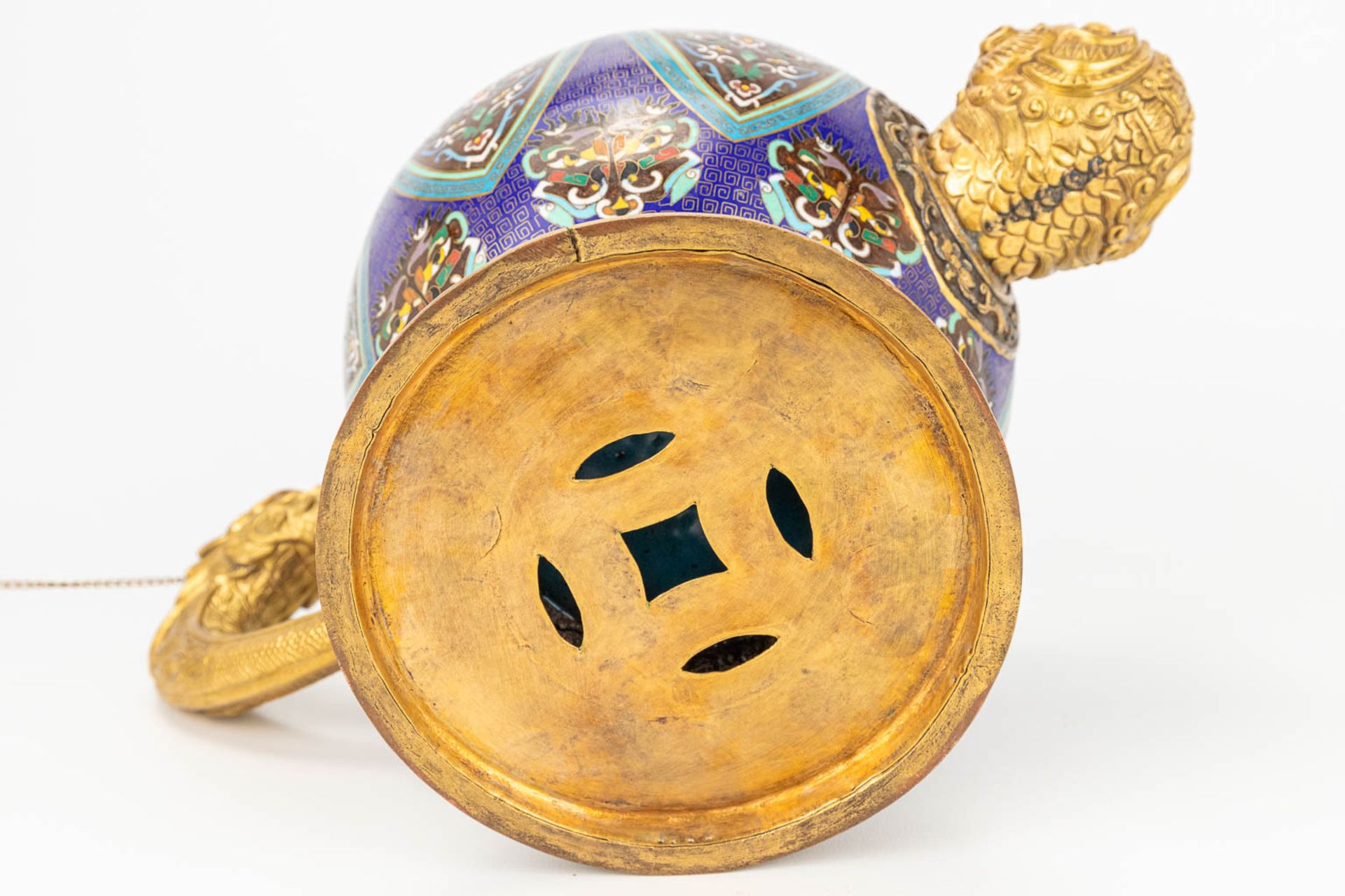 A Tibetan ceremonial ewer made of gilt bronze and finished with cloisonnŽ bronze. - Image 10 of 18