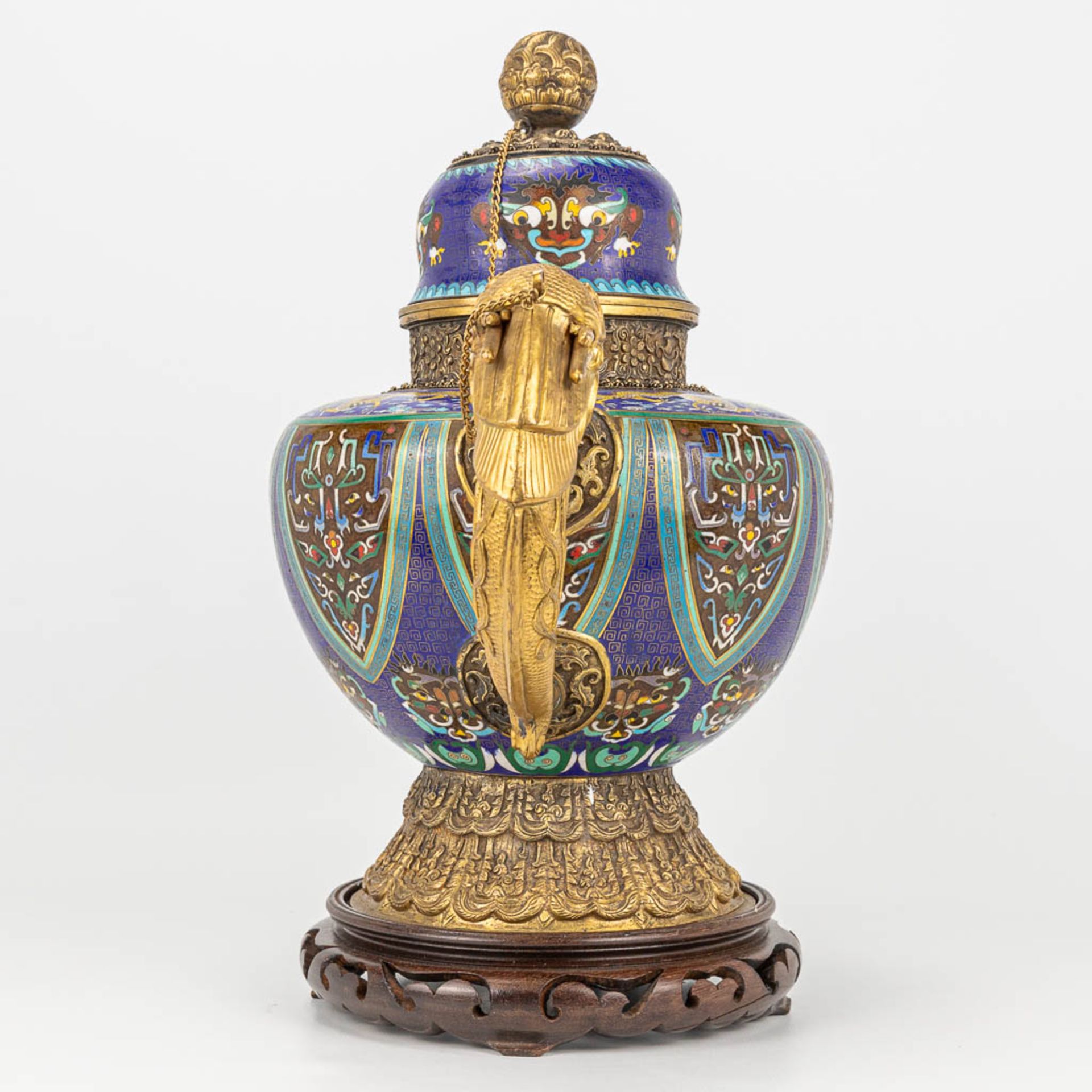 A Tibetan ceremonial ewer made of gilt bronze and finished with cloisonnŽ bronze. - Image 5 of 18