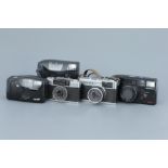 Five Olympus Compact Cameras