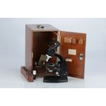 A Binocular Microscope By Cooke Troughton & Simms,