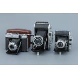 Three Folding Cameras,