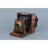 A J. Lancaster & Son Quarter Plate Mahogany Camera,