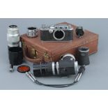 A Leica IIIc Rangefinder Outfit,