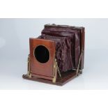 A Mc Kellen's Treble Patent 10x12" Mahogany Field Camera,