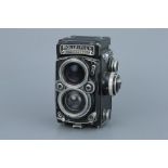 A Rollei Rolleiflex 2.8E Dummy TLR Camera,