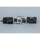 Three 35mm Compact Cameras,