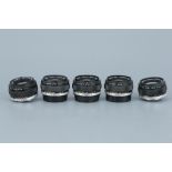 Five Olympus f/1.8 50mm Lenses