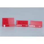 Three Red Acrylic Leica Display Stands,