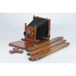 A Houghton-Butcher Victo Half Plate Mahogany Field Camera,