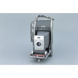 A Polaroid Land Camera 900 Electric Eye Medium Format Camera,