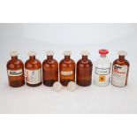 A Selection of Glass Chemical Storage Bottles,