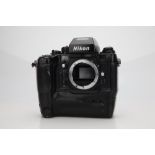 A Nikon F4 35mm SLR Camera,