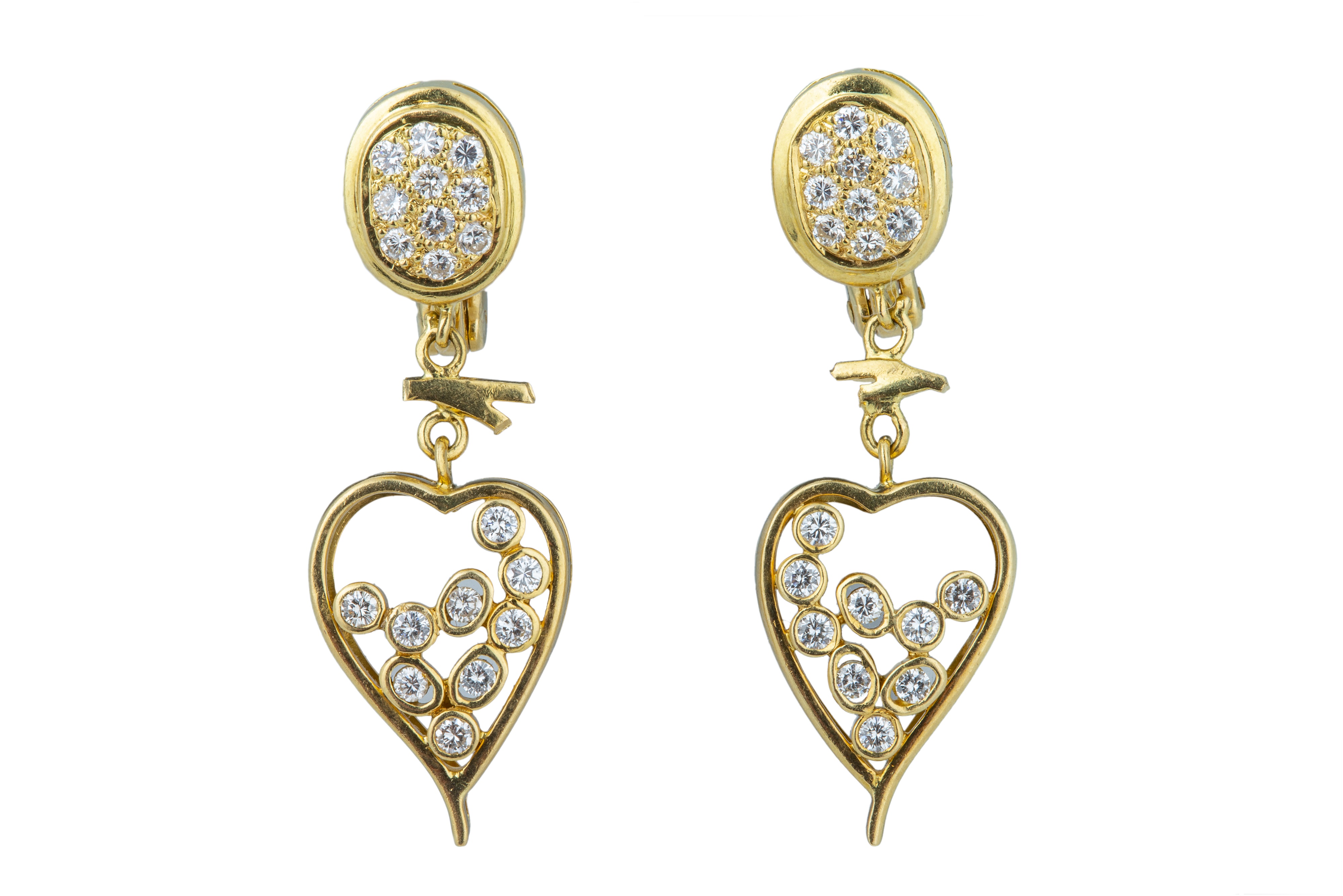 A pair of diamond earrings.