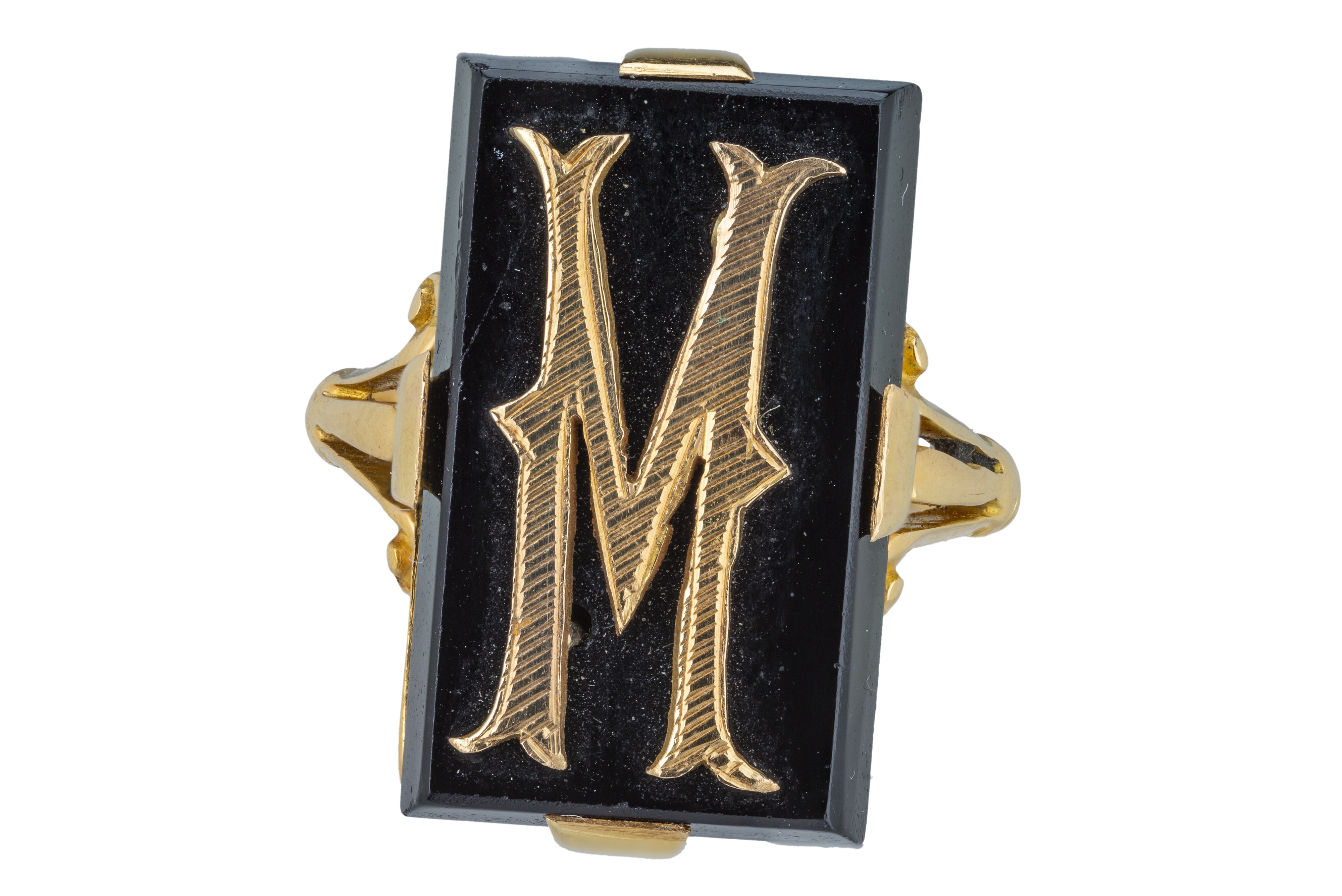 A yellow gold and onyx signet ring.