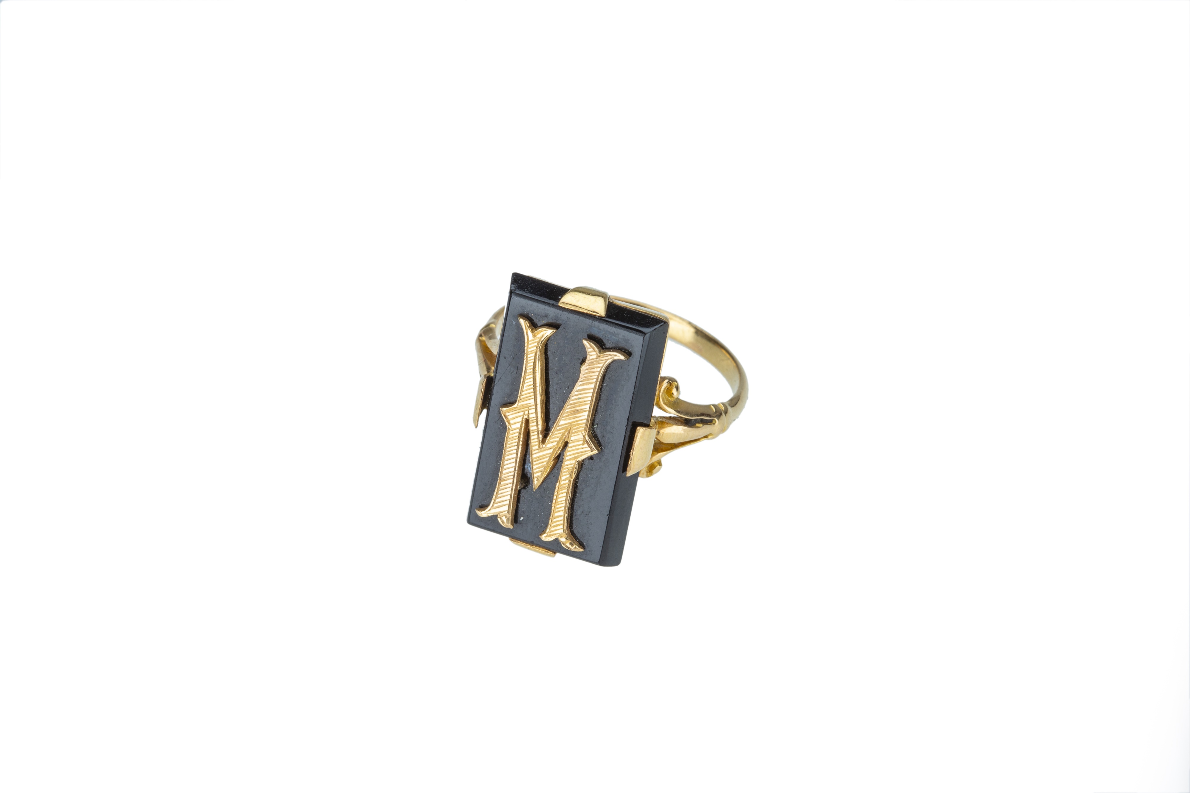A yellow gold and onyx signet ring. - Image 2 of 2