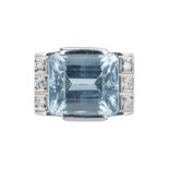 An Art Deco aquamarine and diamond dress ring.