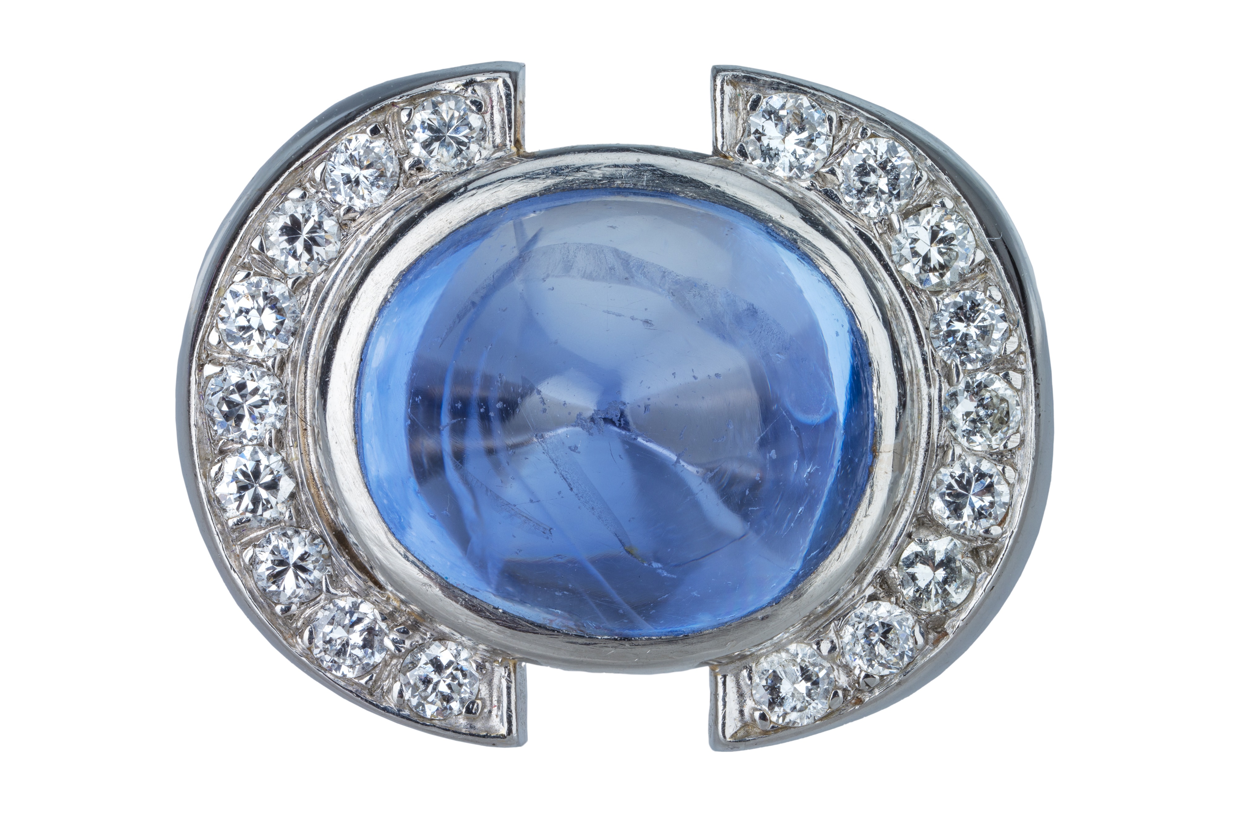 A French Art Deco cabochon sapphire and diamond cocktail ring.