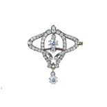 A late 19th century French diamond scroll brooch.