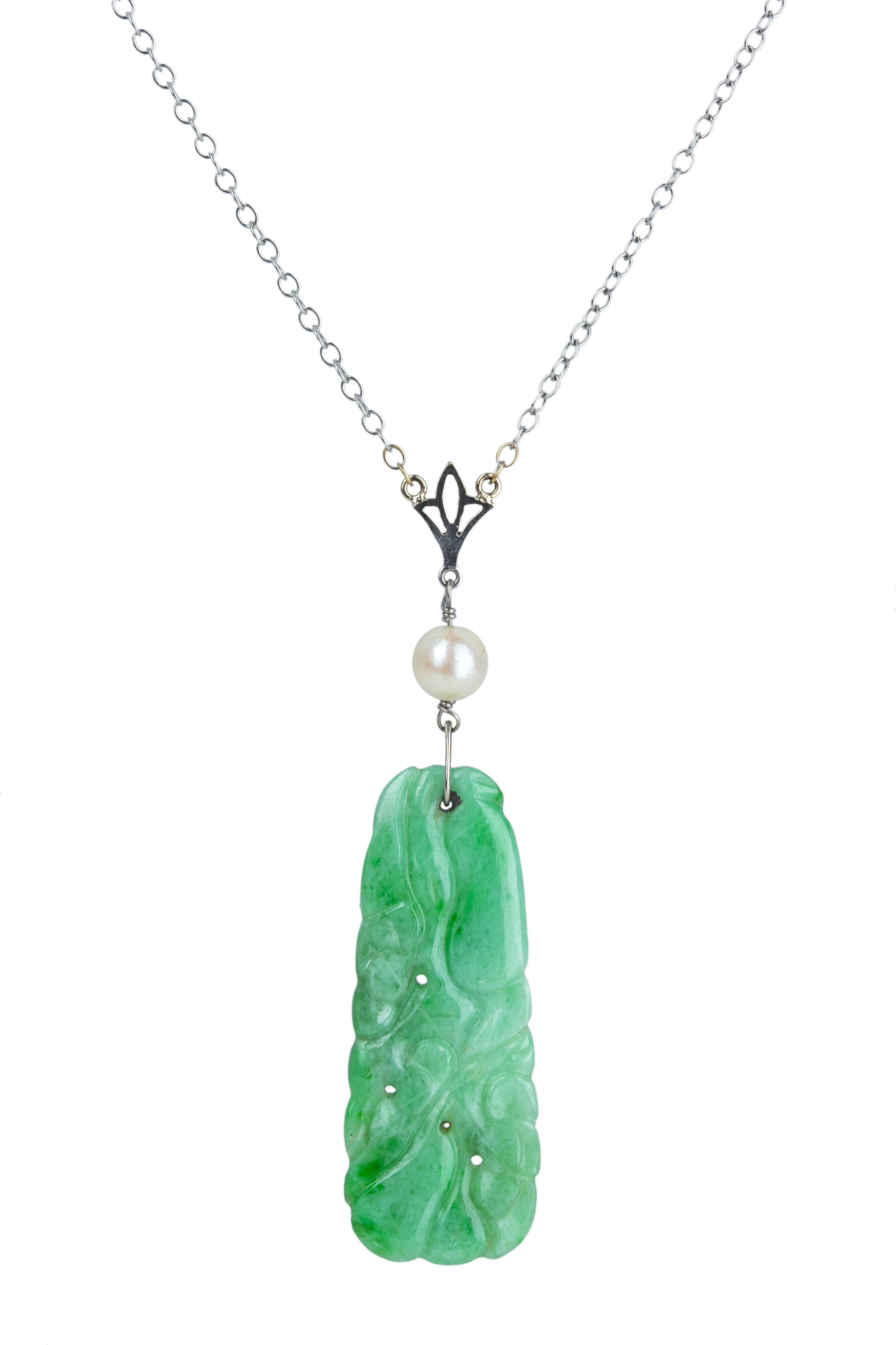 An Art Deco jadeite and pearl pendant.