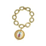 MELLERIO. An 18 ct gold bracelet with gem set bird charm.