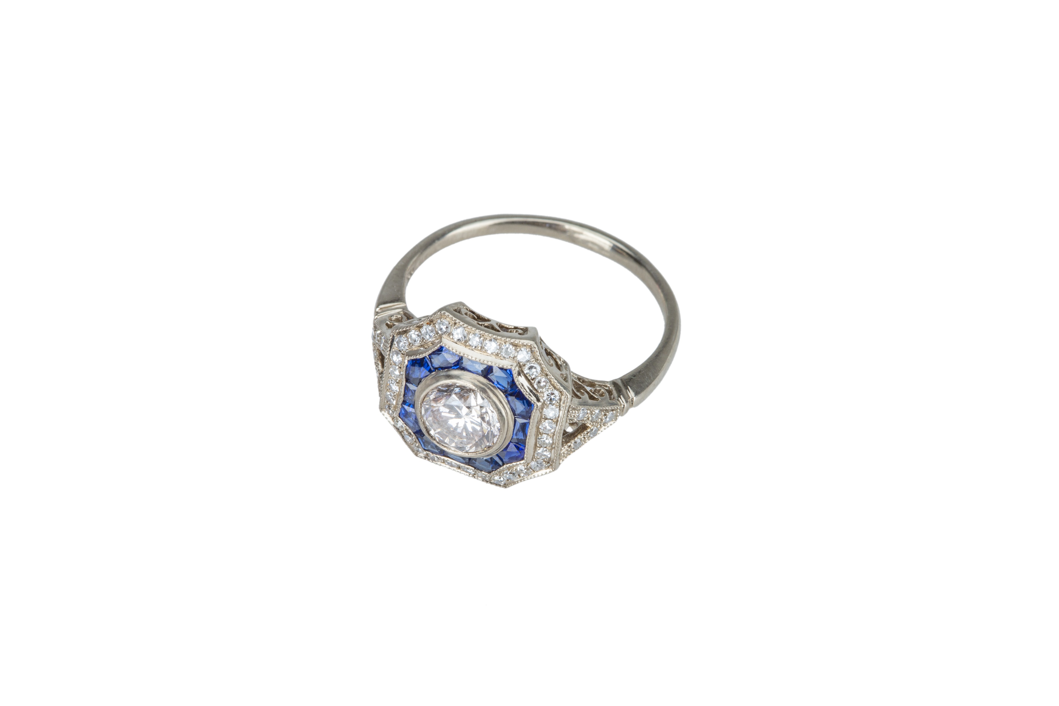 An Art Deco diamond and sapphire target cluster ring. - Image 2 of 5