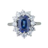A striking sapphire and diamond cluster ring.