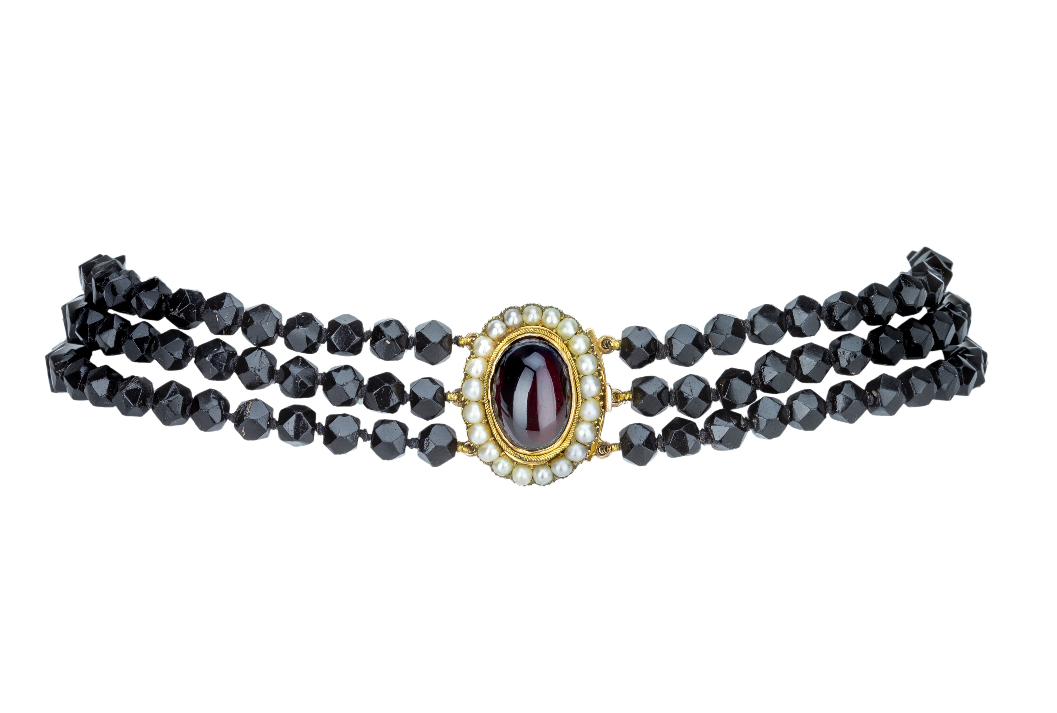 A late Victorian jet and red garnet choker.