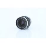 An Olympus G.Zuiko f/3.5 20mm Lens,