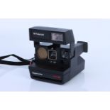 A Polaroid Supercolor 670 SE Camera,