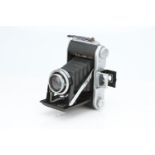An Ensign Selfix 820 Folding Camera,