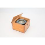 A Cased Floating Card Compass,