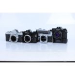 Four Nikon SLR Bodies / Cameras,