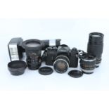 A Canon F1 SLR Camera Outfit,
