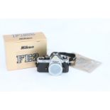 A Nikon FE2 SLR Body,