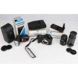 A Minolta Dynax 600si Classic SLR Camera,