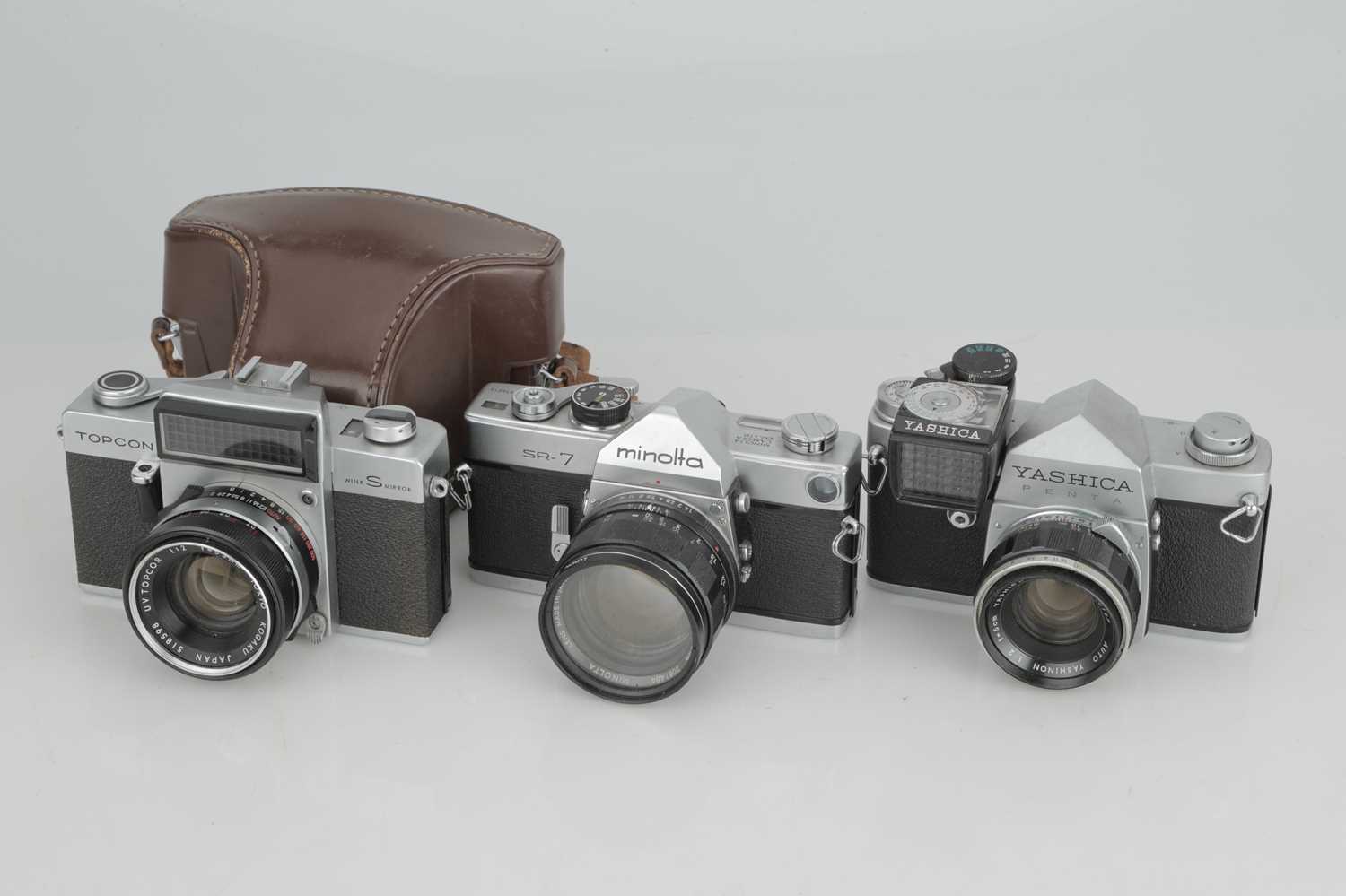Three Japanese 35mm SLR Cameras,